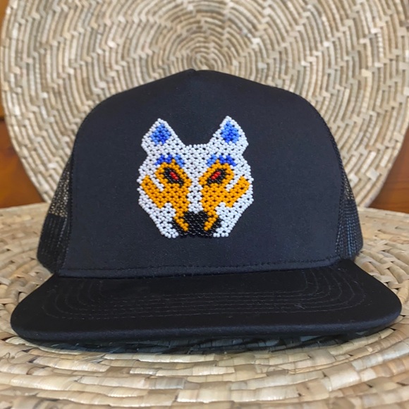 Other - Beaded Fox Snapback Hat

Huichol Beaded front logo